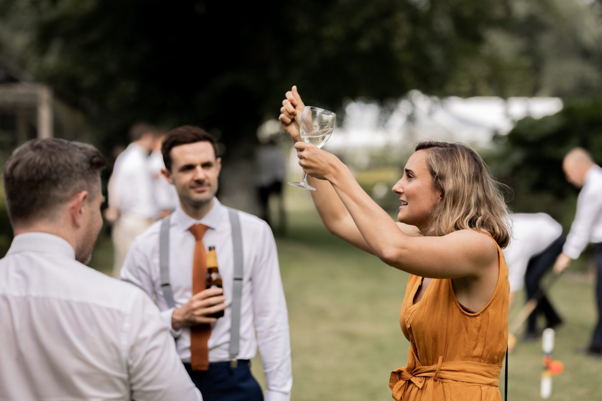 A natural candid shot of wedding guests enjoying themselves
