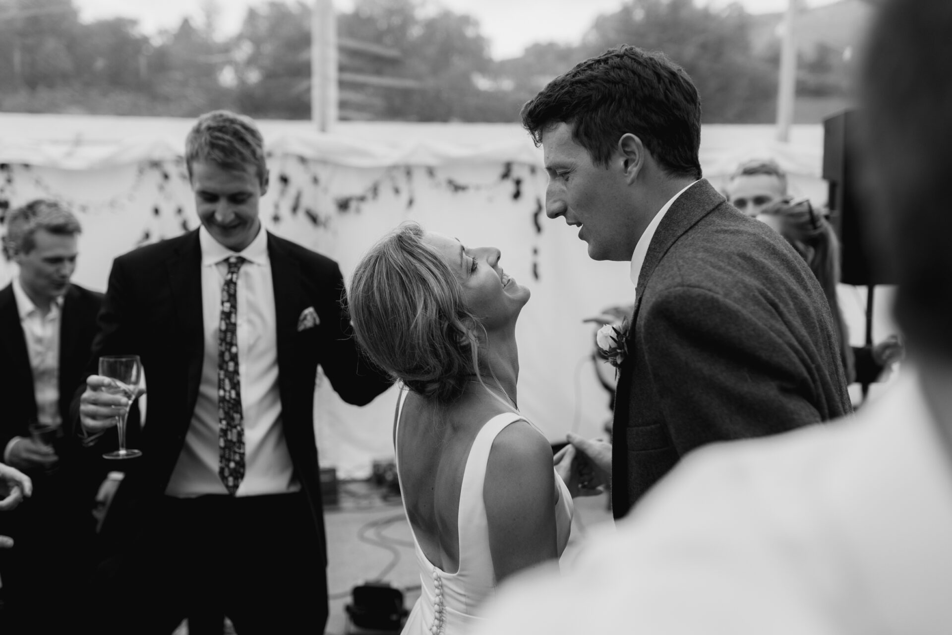 The bride and groom dance at their Devon marquee wedding