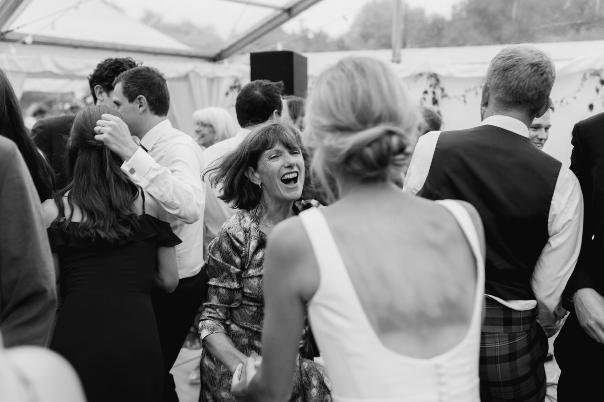 Wedding guests dance at a Devon marquee wedding