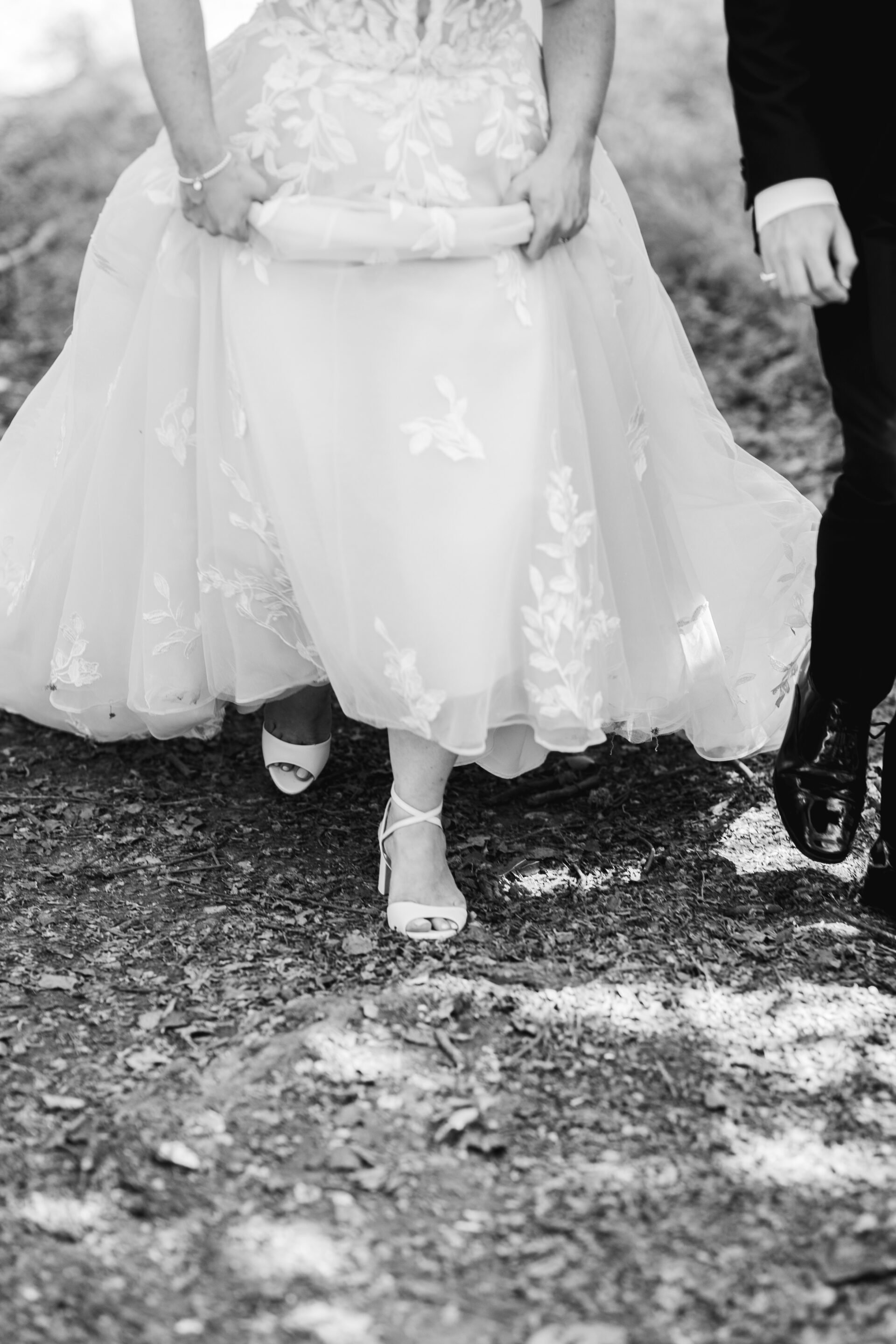 Bridal shoes captured at Old Luxters Barn in Oxfordshire