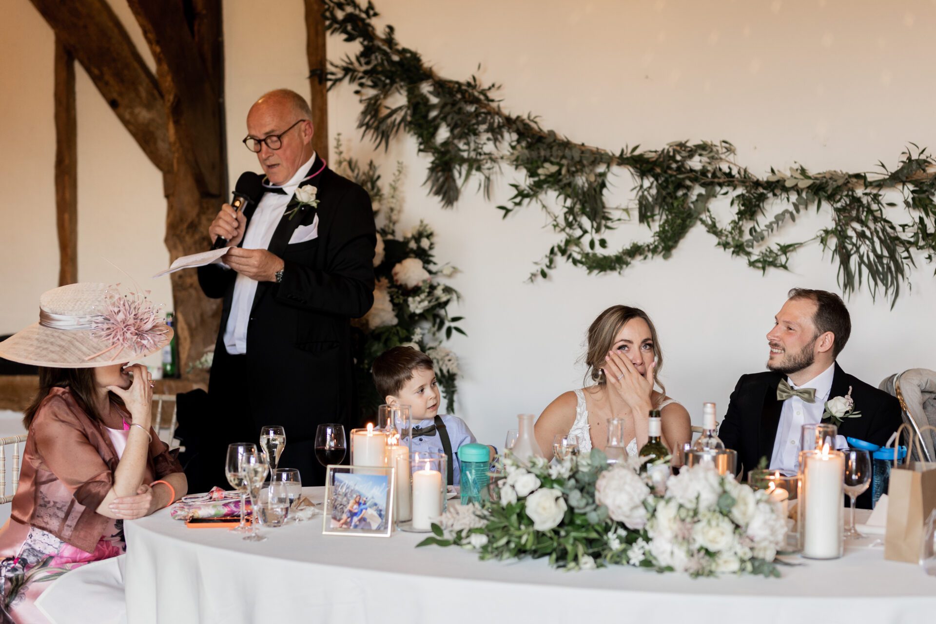 The father of the bride gives a speech at Old Luxters Barn wedding venue in Oxfordshire