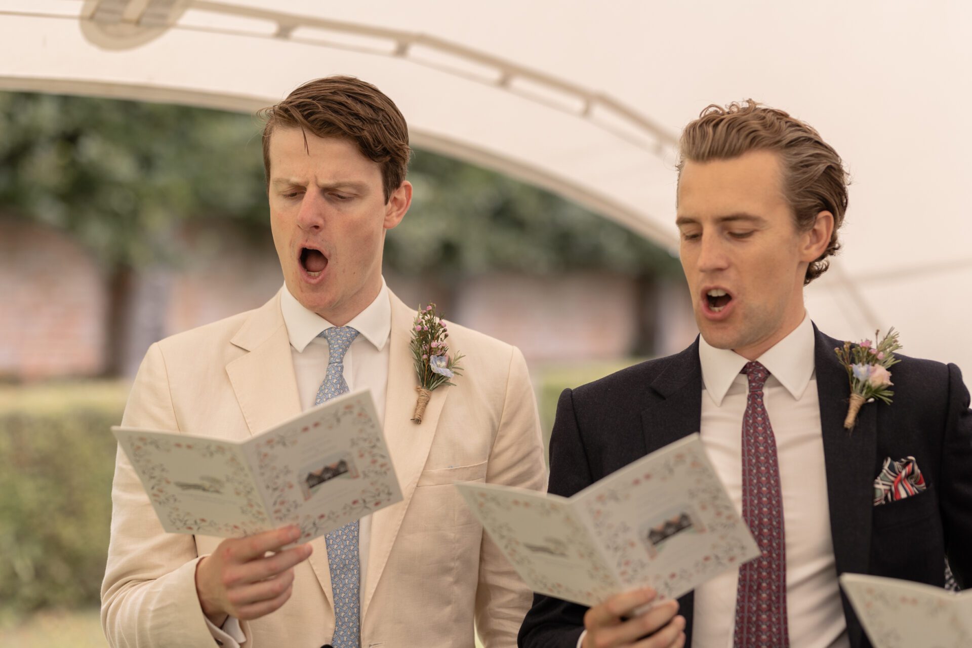 The wedding guests sing during the wedding ceremony