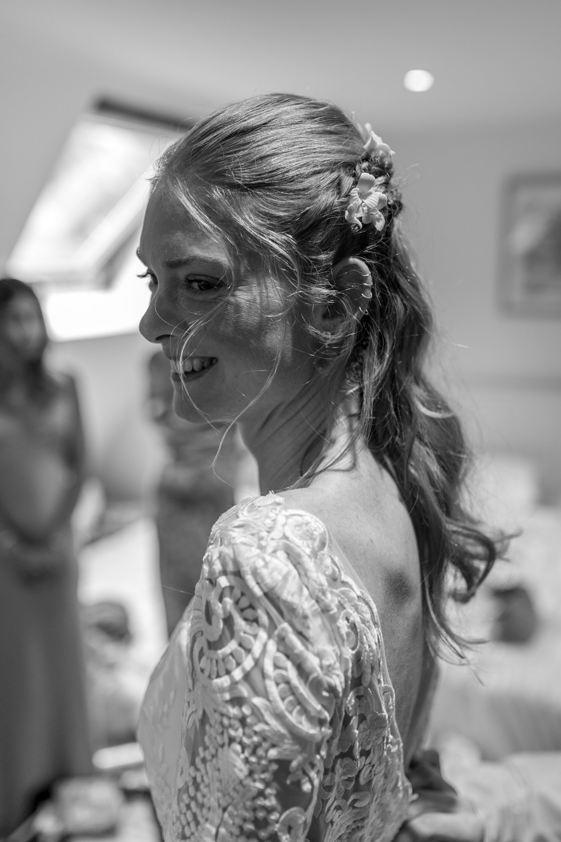 A black and white editorial wedding photograph of our bride