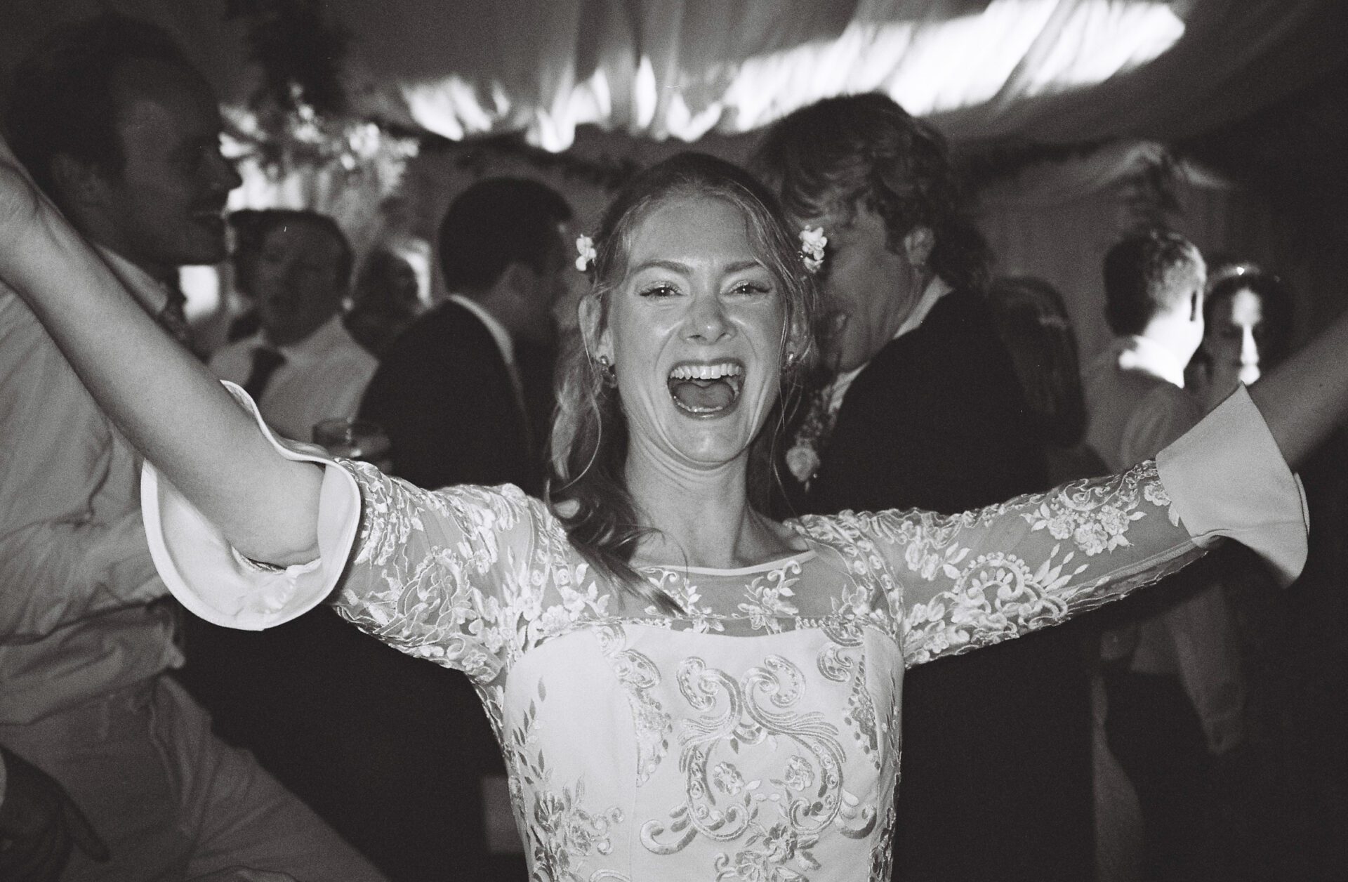 A 35mm portrait of the bride on the dancefloor