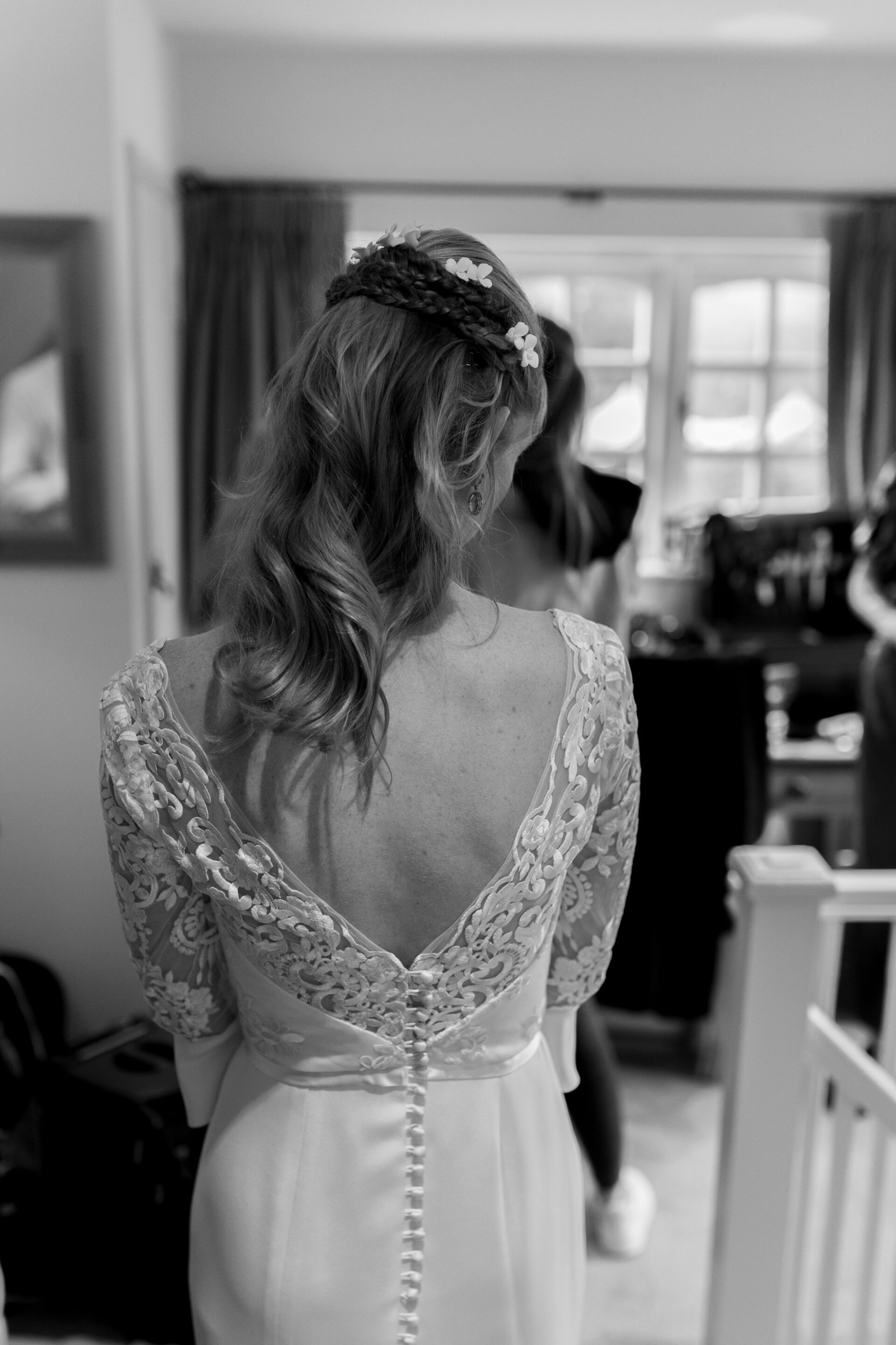 Details of the bride's bespoke wedding dress from Louise Selby