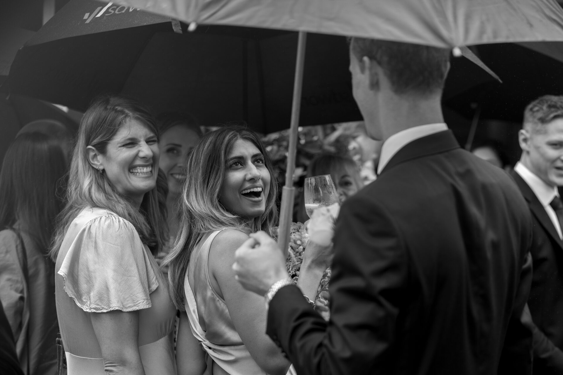 The wedding guests mingle at Kent wedding venue Brickwall House