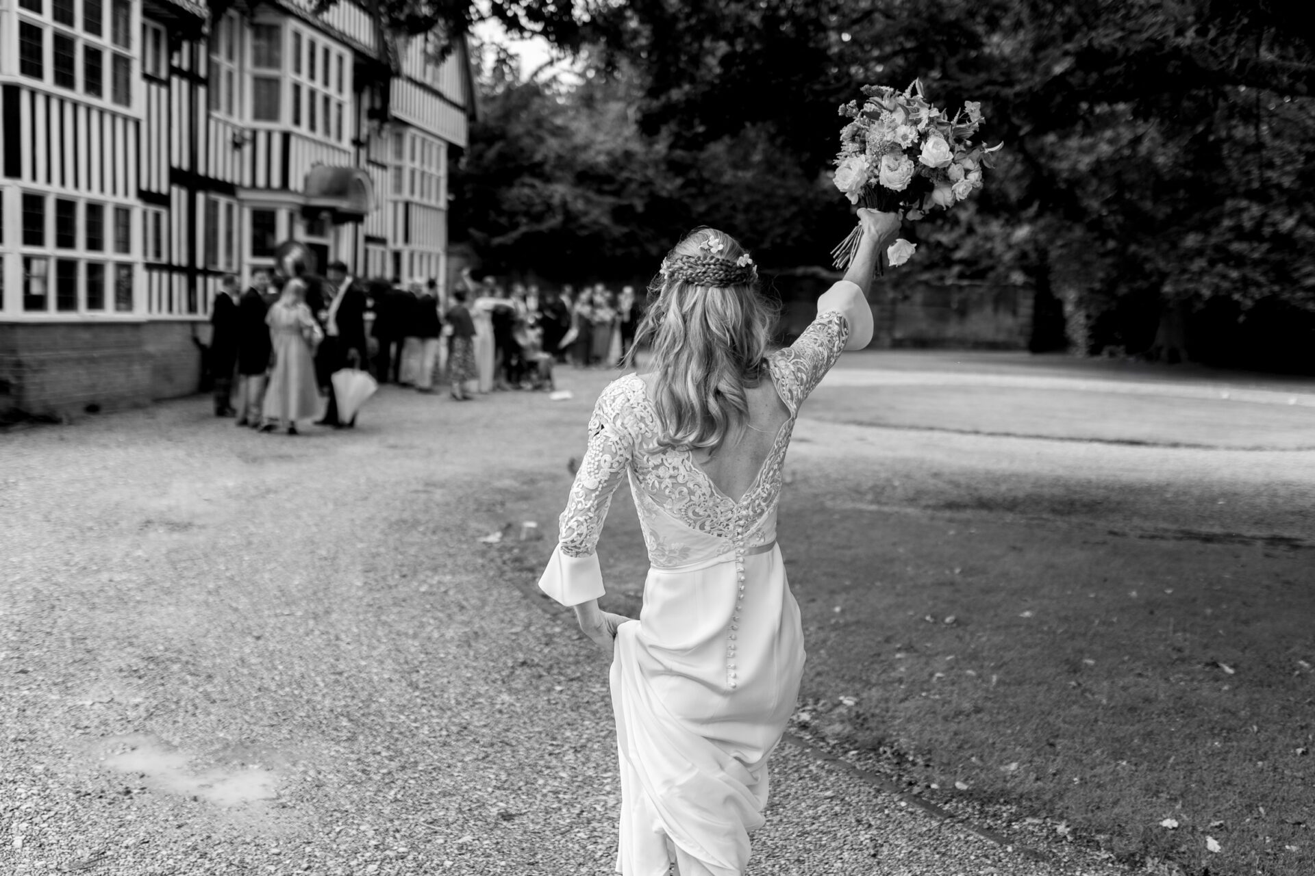 The bride greets her wedding guests at her Kent wedding