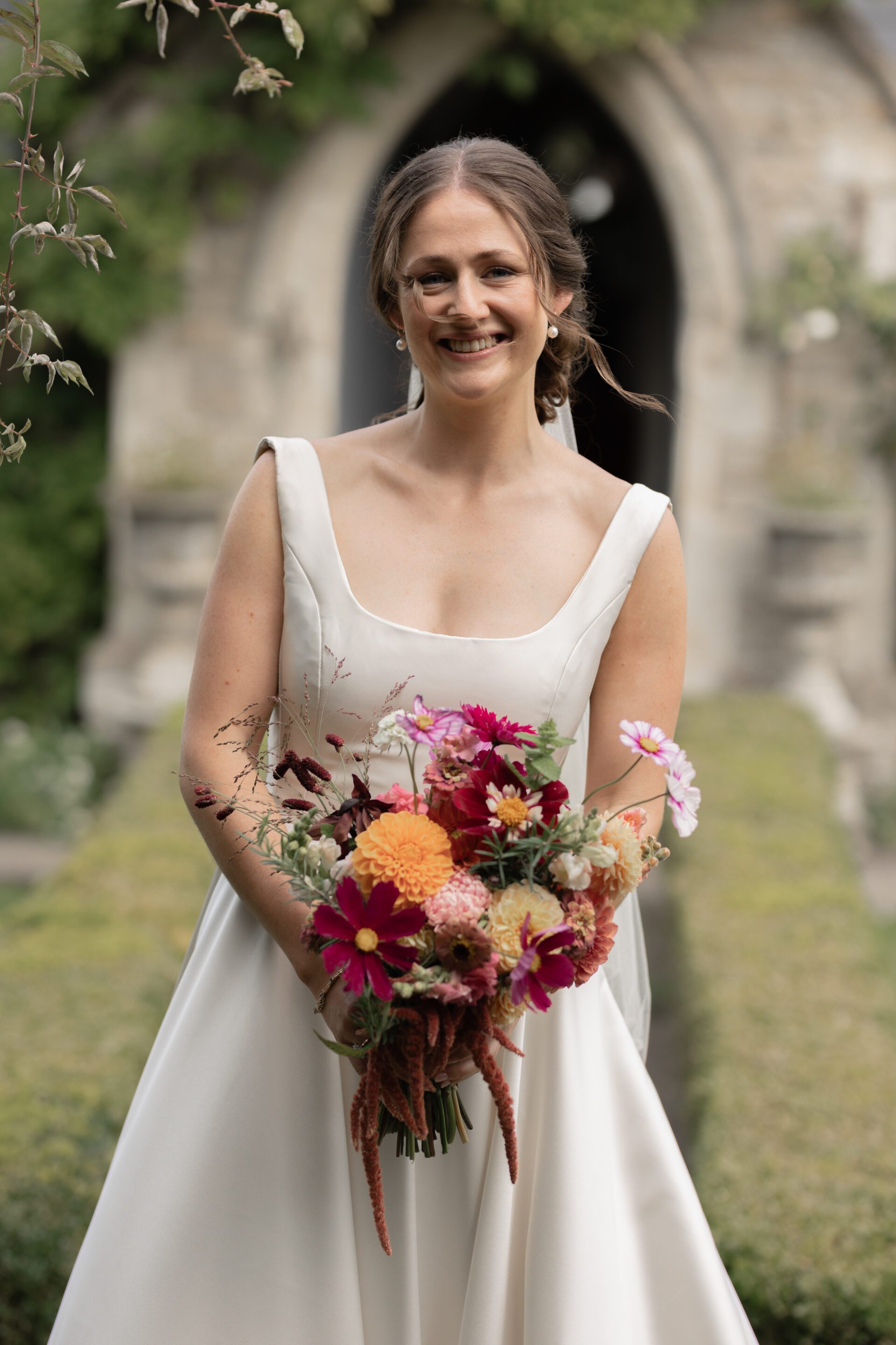 Relaxed bridal portrait before Somerset church wedding
