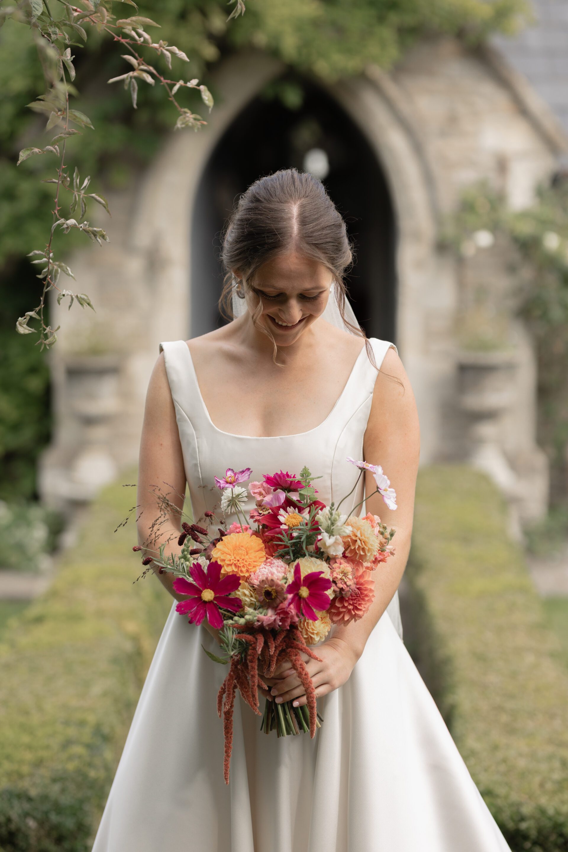 Relaxed bridal portrait before Somerset church wedding