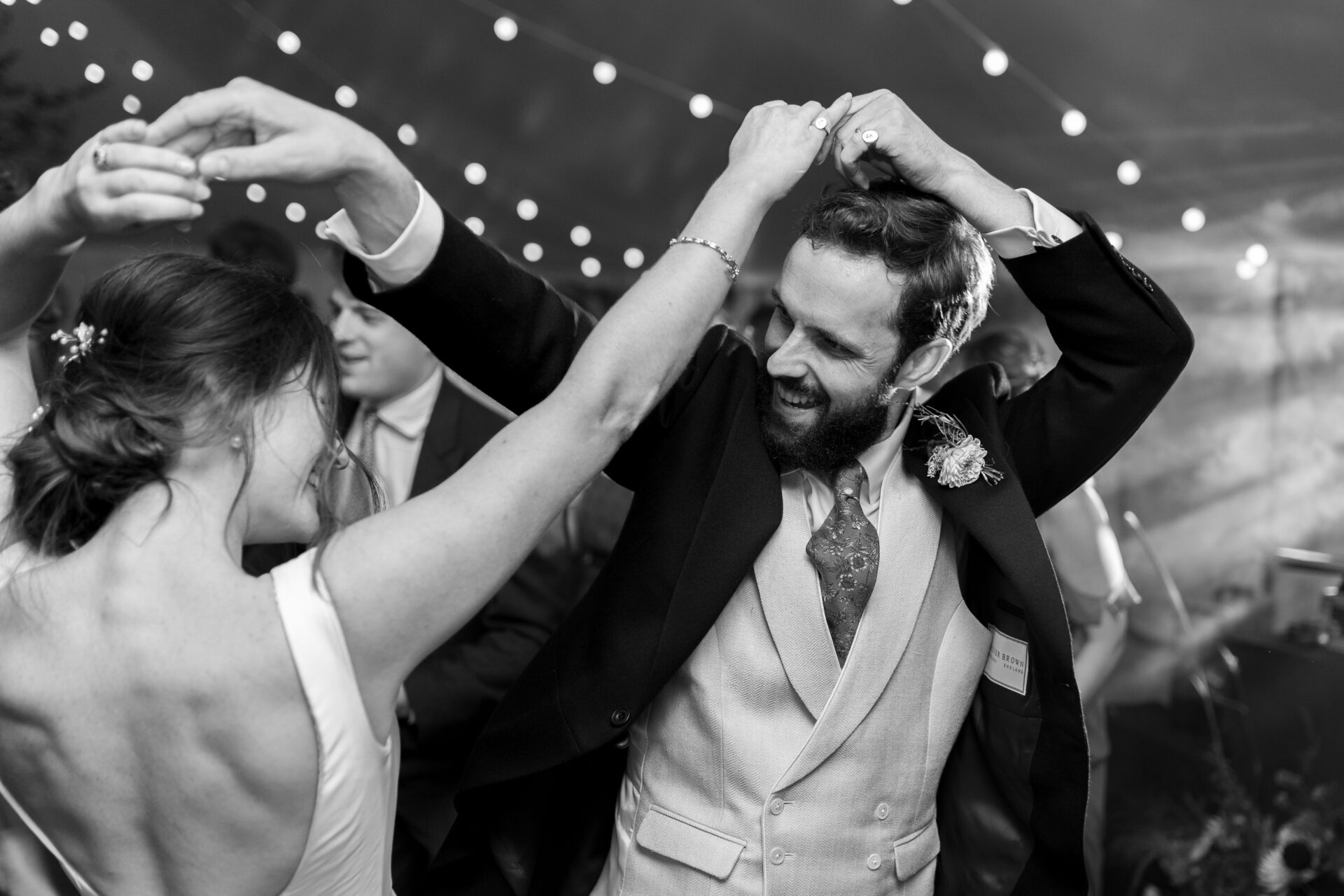 The bride and groom share their first dance at Somerset marquee wedding