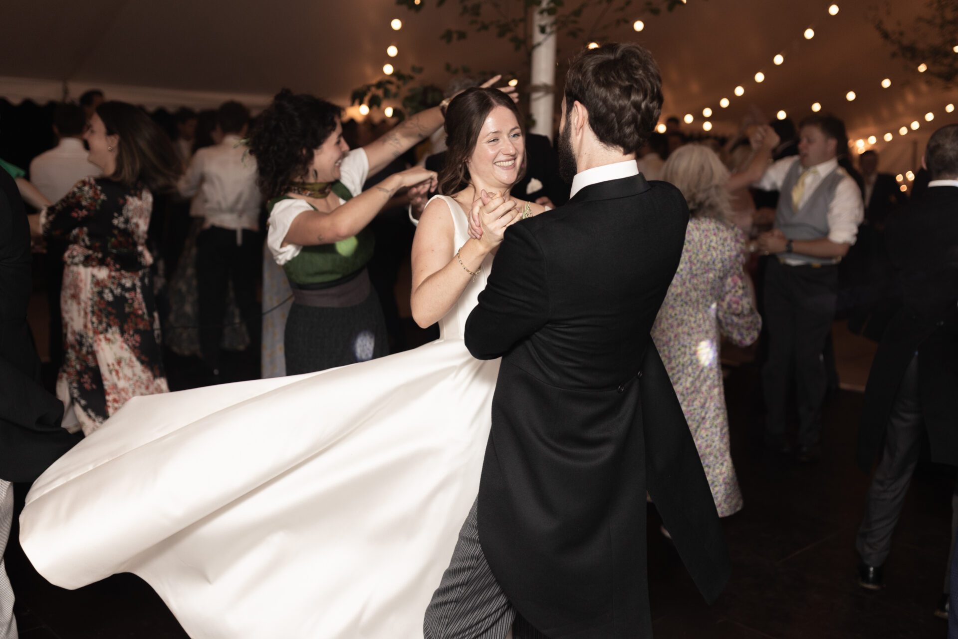 The bride and groom dance at their Somerset marquee wedding