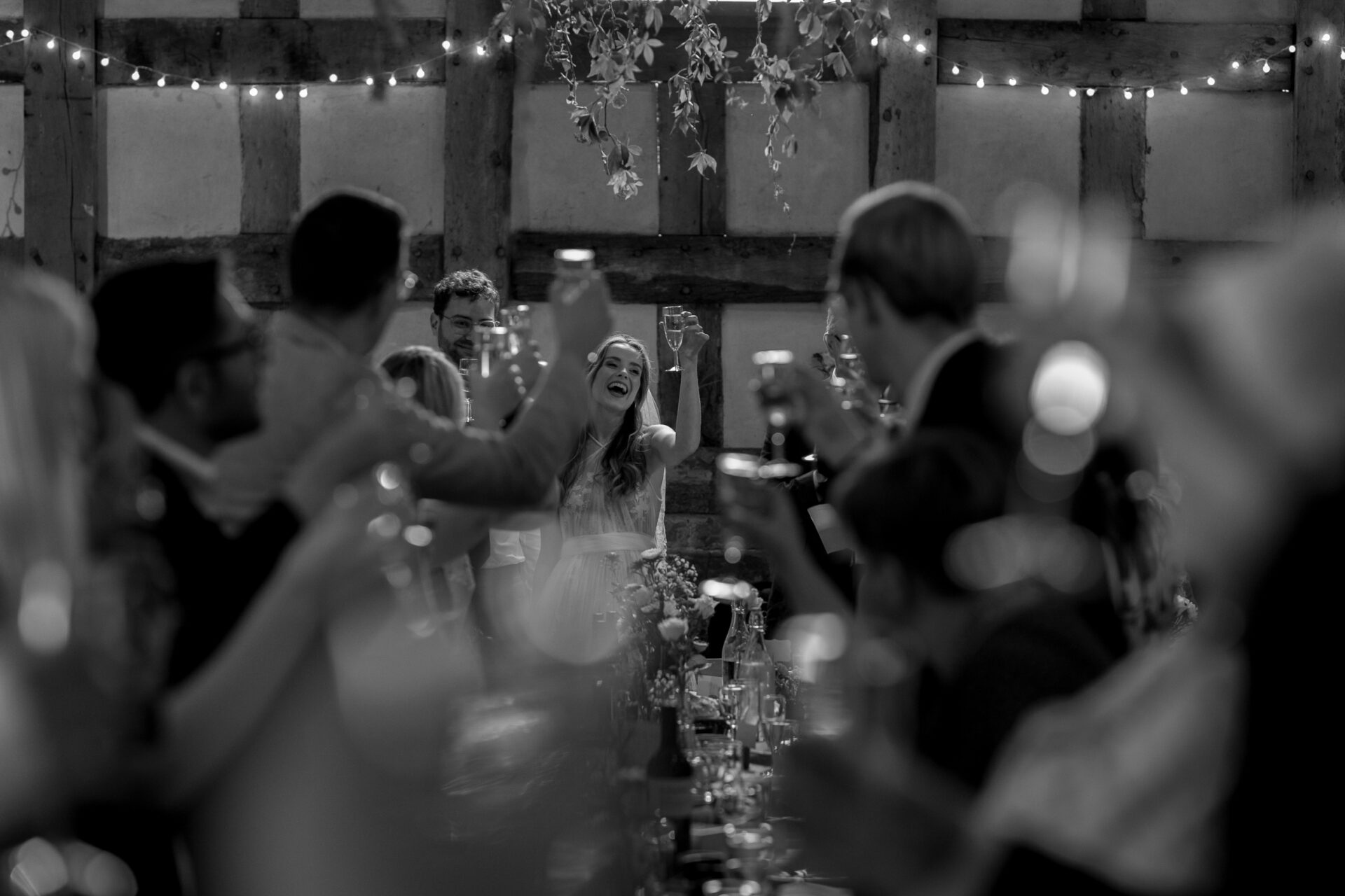 Wedding toasts at the Wool Barn, Gloucestershire wedding venue in Frampton
