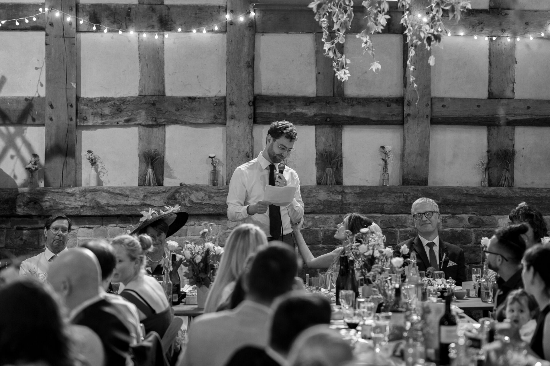 The groom gives a speech at the Wool Barn, Gloucestershire wedding venue in Frampton