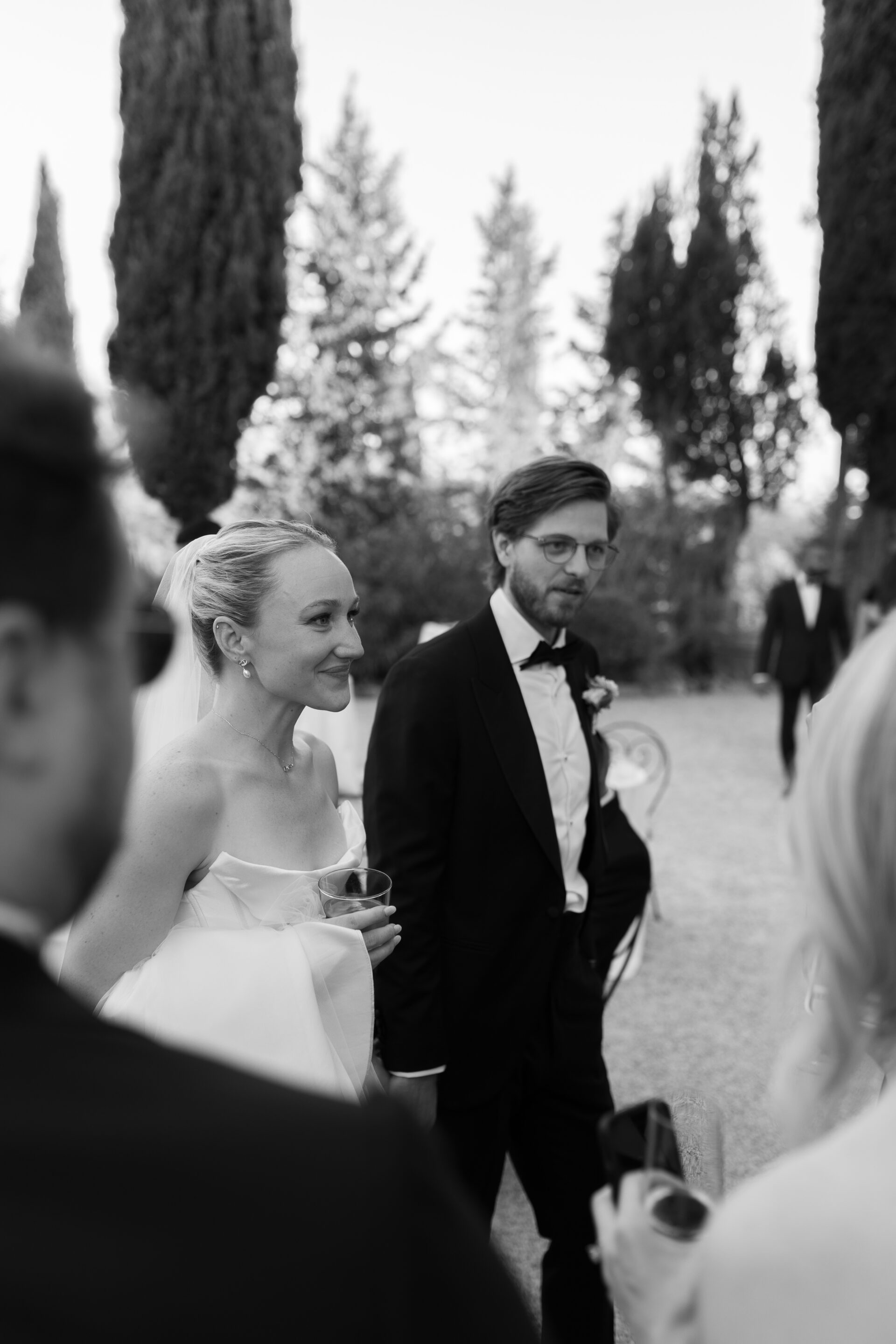 The bride and groom mingle with guests at Italian wedding reception in Italy
