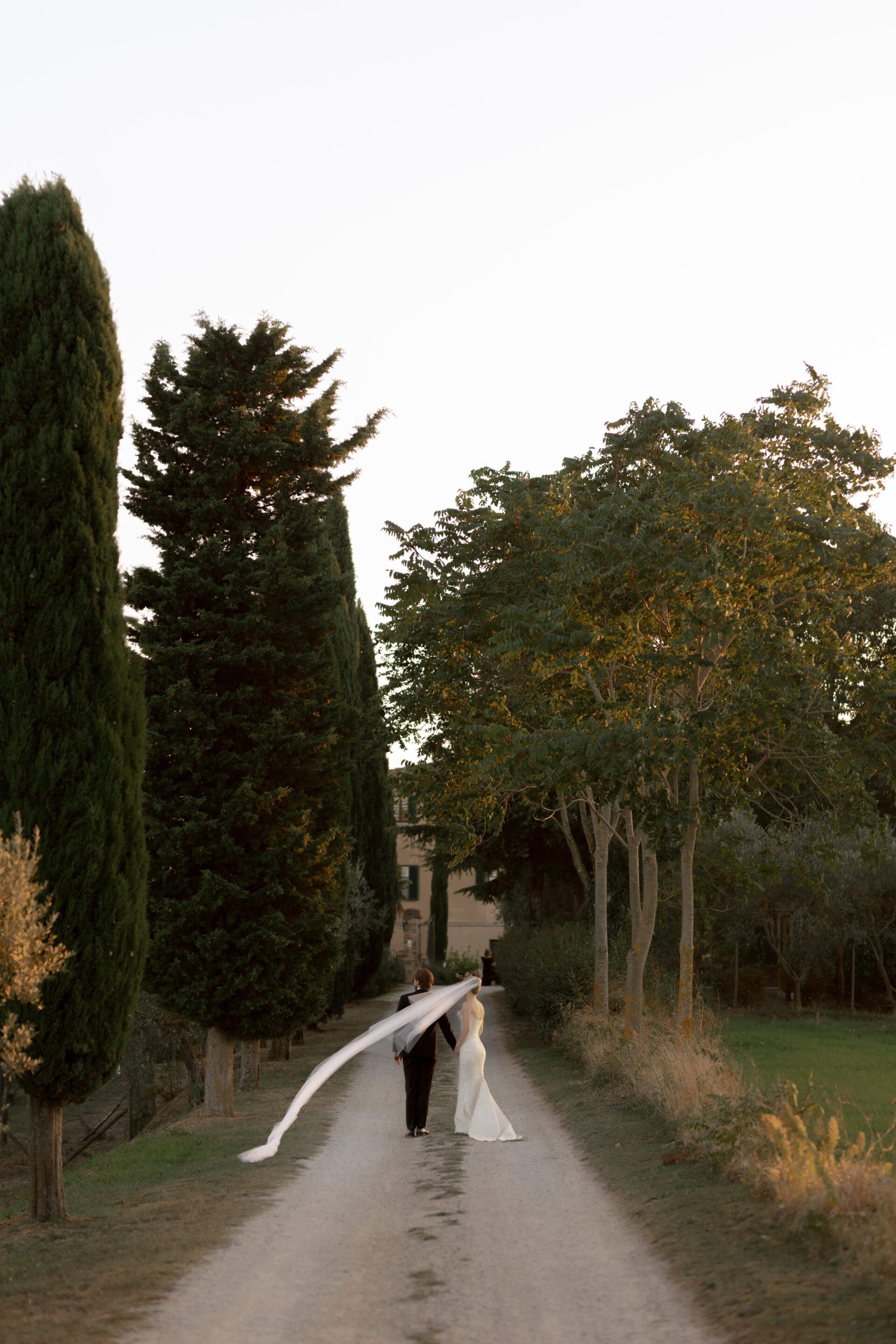 Golden hour couple portrait session at luxury Tuscan wedding