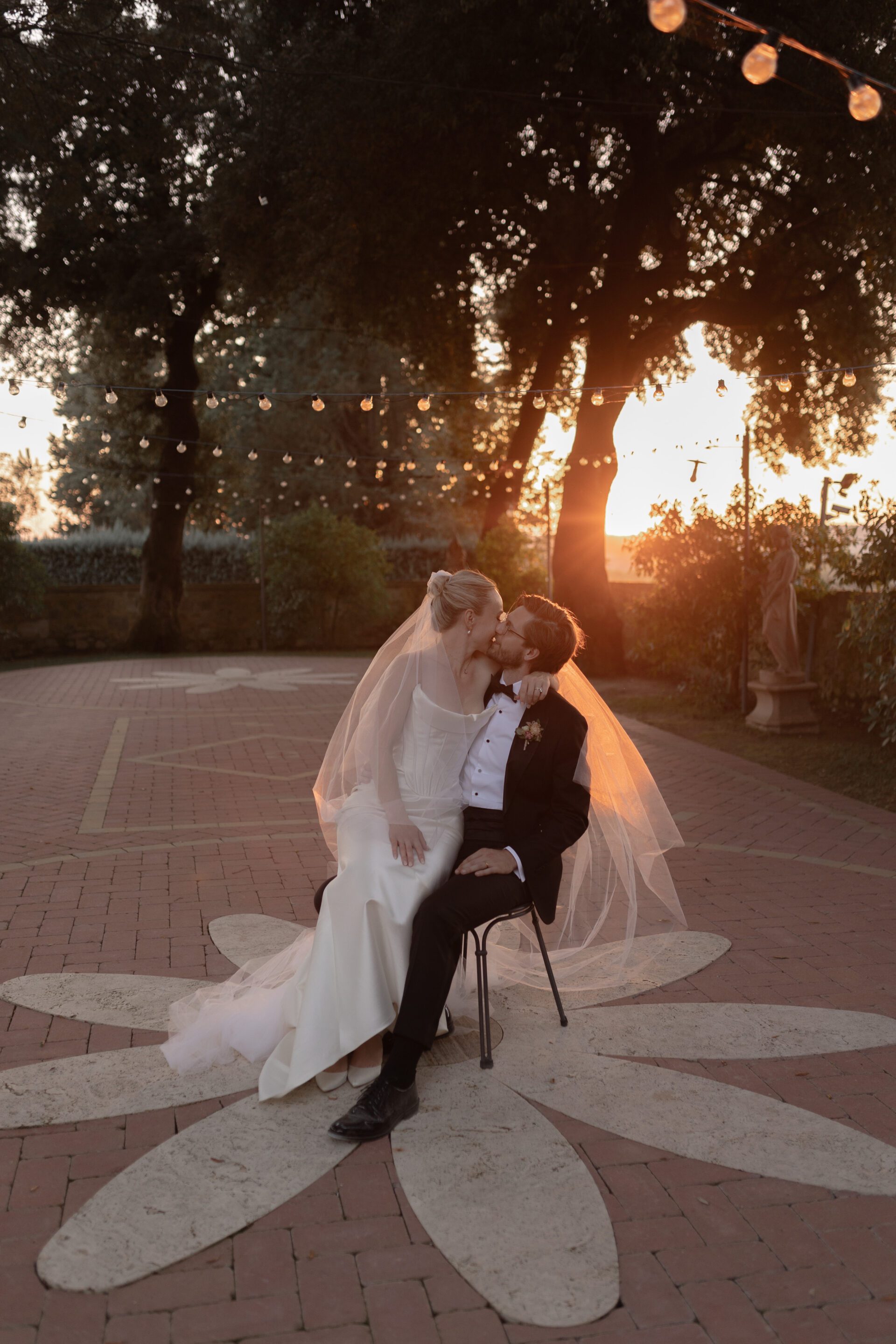 Italian wedding photography captures golden hour couple portrait session at luxury Tuscan wedding