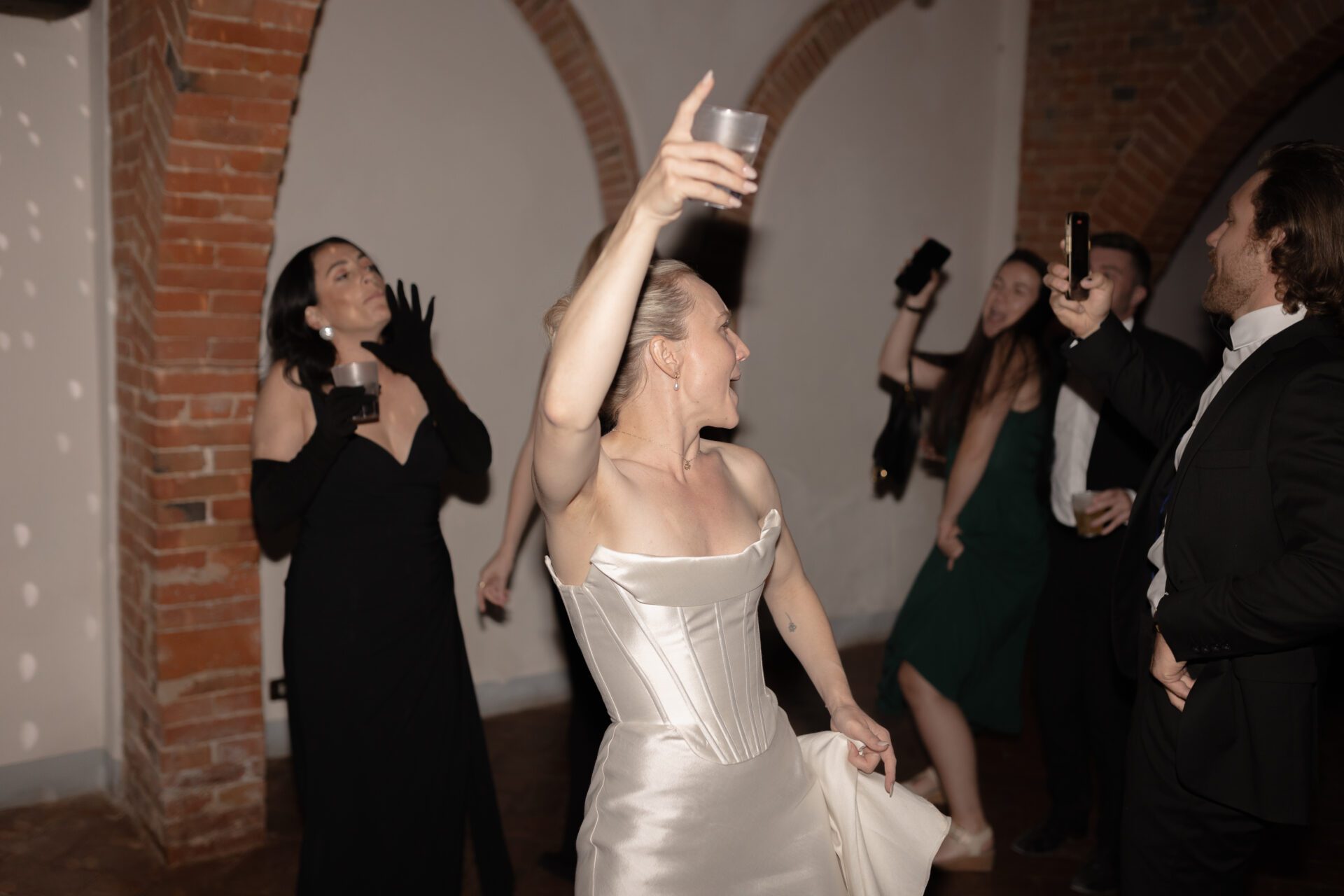 The bride enjoys the afterparty at her luxury Italian wedding