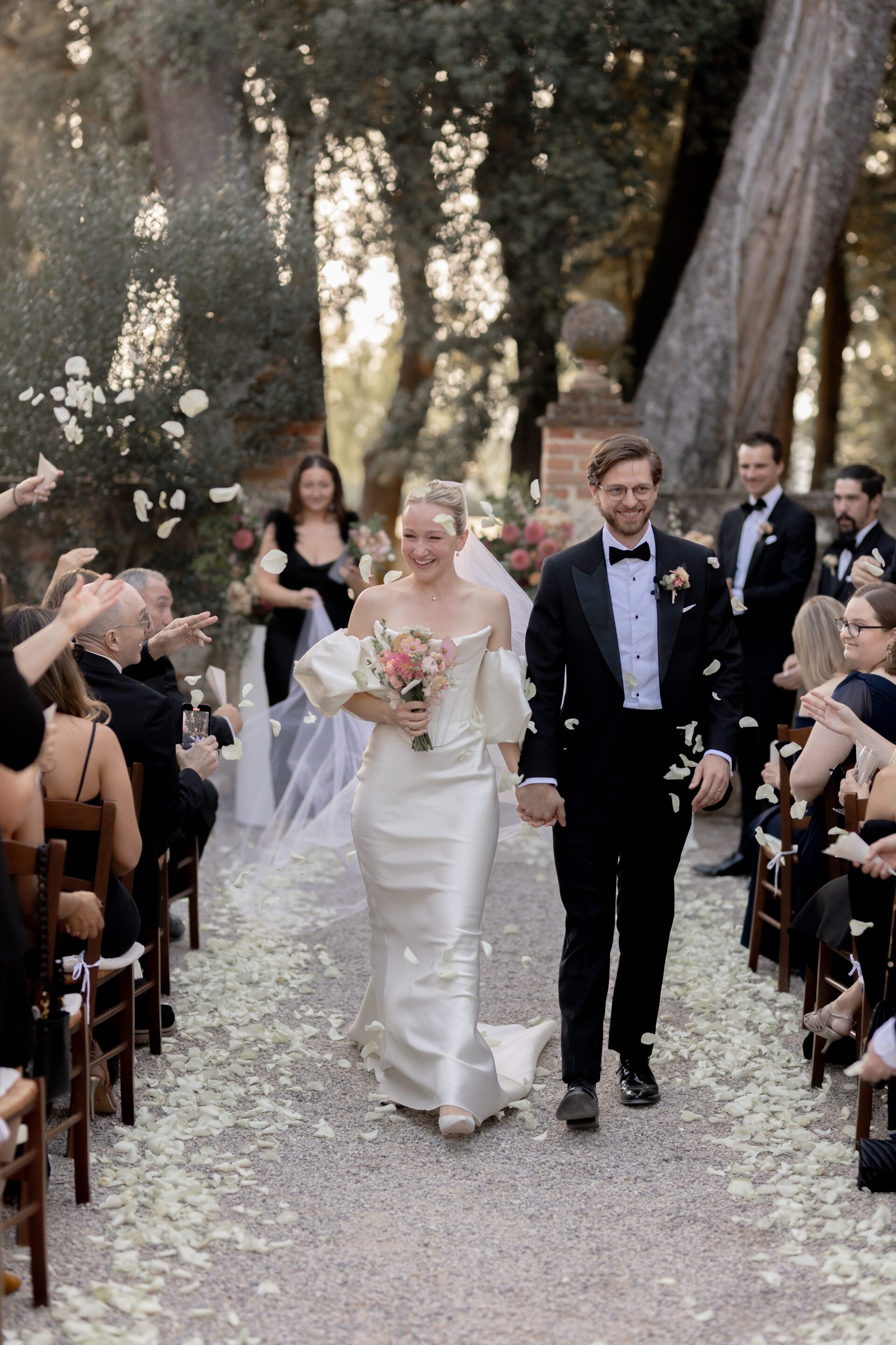 Confetti tunnel at luxury Italian wedding ceremony