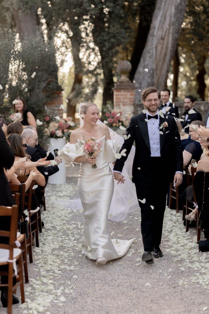Destination wedding photographer captures confetti throw at Italian wedding ceremony